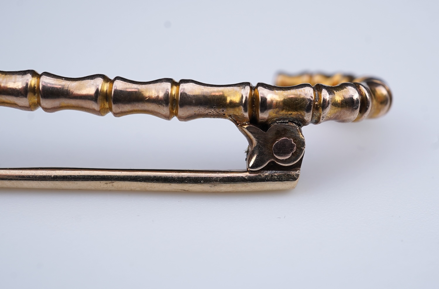 A collection of four tie pins, circa 1900